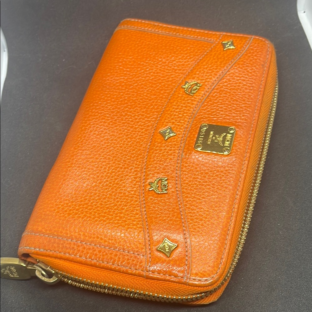 MCM Tangerine Leather Wallet with Gold Accents